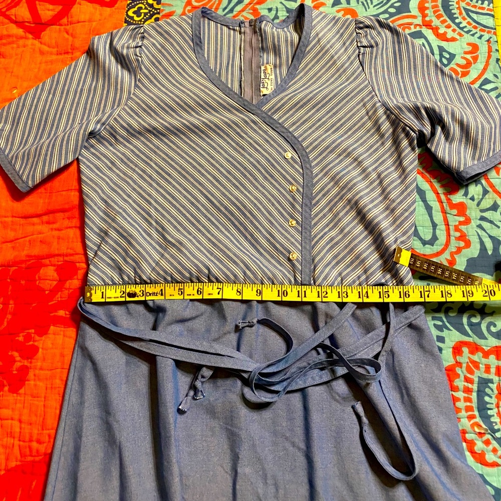 1980s vintage blue denim-look midi length dress.